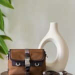Prada’s Re-Nylon and leather flap shoulder bags
